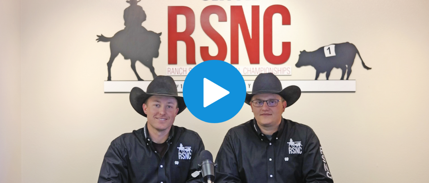 A play button over an image of two cowboys wearing black hats sitting at a desk in front of an RSNC logo