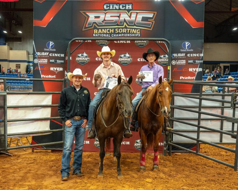 Les Henderson and Tucker Weatherford on horseback holding championship buckles at the 2026 Cinch RSNC World Finals in Fort Worth